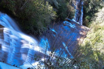 Twofer
Here is an odd waterfall. Two creeks merging at nearly opposites directions, plunging over rock walls into a common creek below.

Hard to explain but, you can drive right up to these falls and see for yourself.
