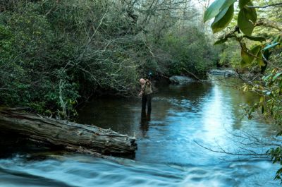 Derick
It takes a tough photographer to stand in cold Greenland Creek in December.

Derick is now baptist as a crew member of OA.
He did this all day, just to get the shot. 
