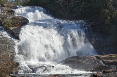 Bridge
Look for the roof of the covered bridge atop the falls.
