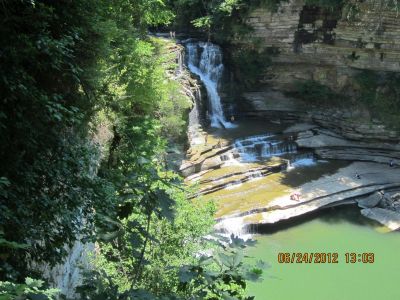 On High
Don't let the description of 50 ft fool you. From this point it is abut 150 ft to the river level below but, the trail down in excellent.

With a little exploring and milling around plan on a four mile hike. 
