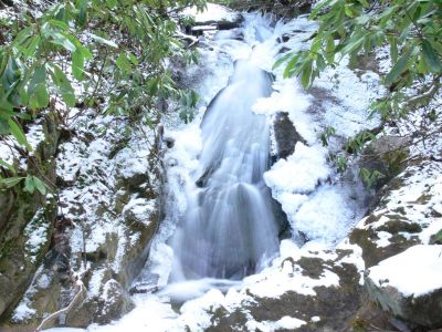 Rock Creek South Branch (1)
This falls can be tricky to find. If you are going to the upper falls, above the foot bridge, keep watching for a downed tree that has been cut about waist level. Turn right just after the tree on the faint trail. Cross the creek and you should see an old brick fire pit. Keep going up the adjacent small creek. This is the South Branch, not the original creekk you started out on.

To find South Branch Falls continue less than 0.2 miles to the falls.
