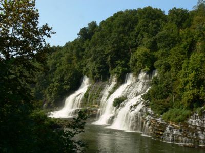 Wall To Wall Waterfall
The falls at Rock Island, TN are just that, wall to wall. 

Due to the leakage from up river through the limestone and back into the lower river there is literally about a mile of waterfalls.
