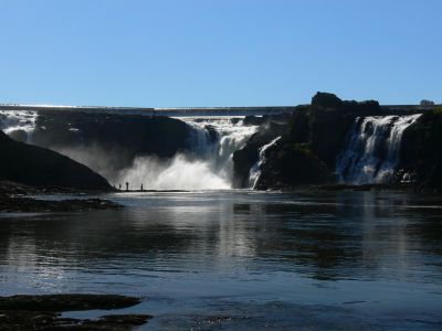 4 views Montmerency Falls just outside Quebec City. Note the even crest of the falls.A hydroelectric dam was built across thetop.

A foot bridge is located just below the falls and you can see the city from there as your walk across. For more information http://www.viator.com/Quebec-City-attractions/Montmorency-Falls-Park/d626-a966
