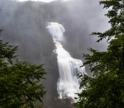 Monster In The Mist
Whitewater Falls NC just after heavy rains. The fog cleared like magic for about ten minutes allowing an old friend to get his first peak at the 400 ft. monster.

Just downstream is a duplicate but, a little harder to hike to.
